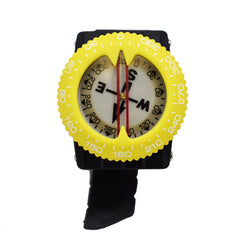 Black diving compass with yellow bezel on a white background