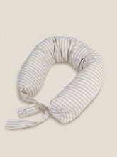 Striped neck pillow on a beige background