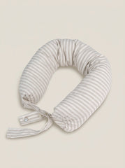 Striped neck pillow on a beige background