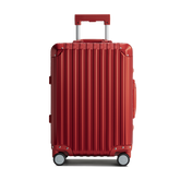 Red suitcase with a textured surface on a white background