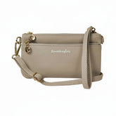 Beige handbag with a strap on a white background, featuring 'Save The Girls' branding.