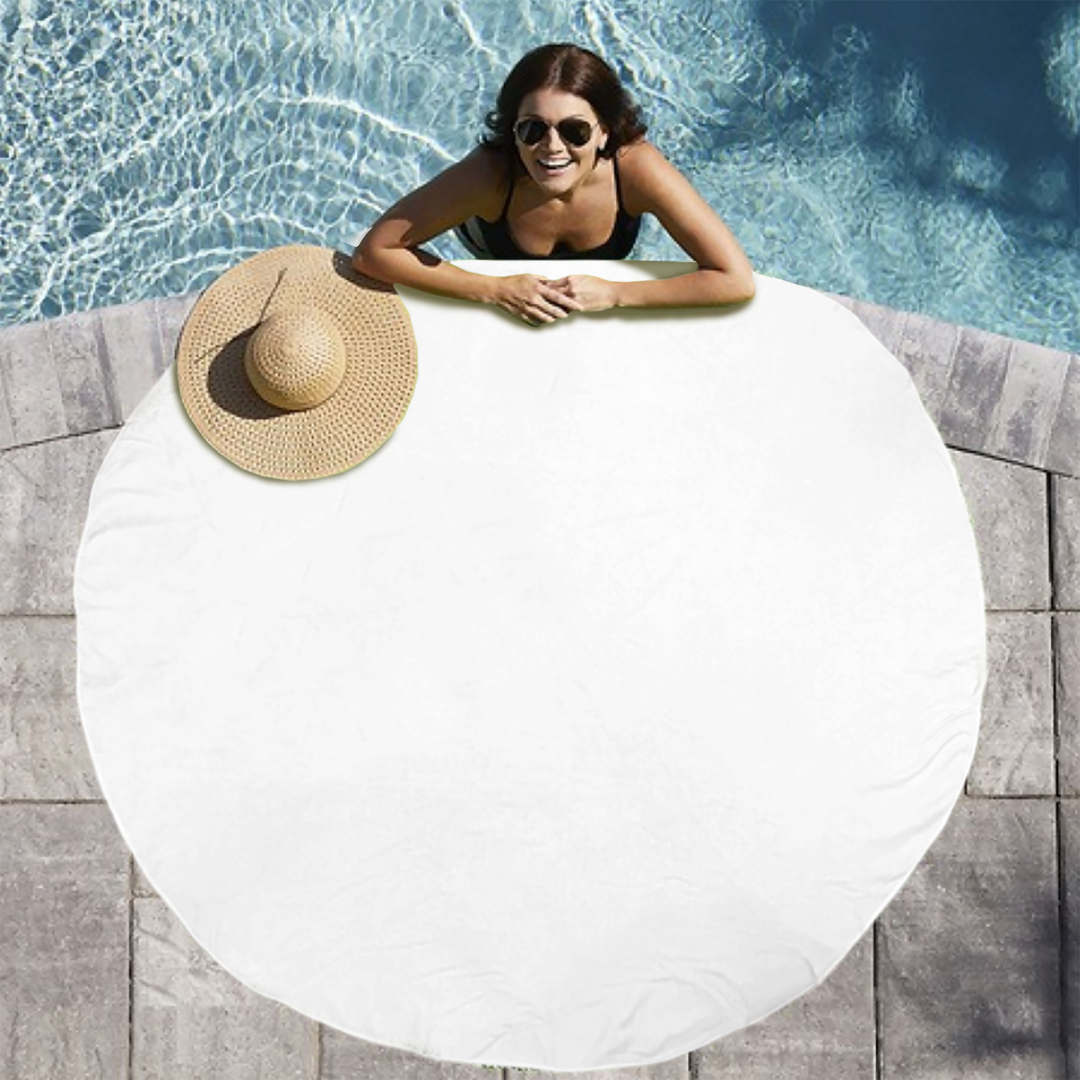 Woman lounging on a white inflatable pool float with a straw hat nearby, by a pool.