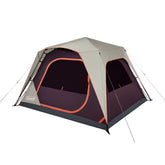 Coleman tent with beige and purple design on a white background