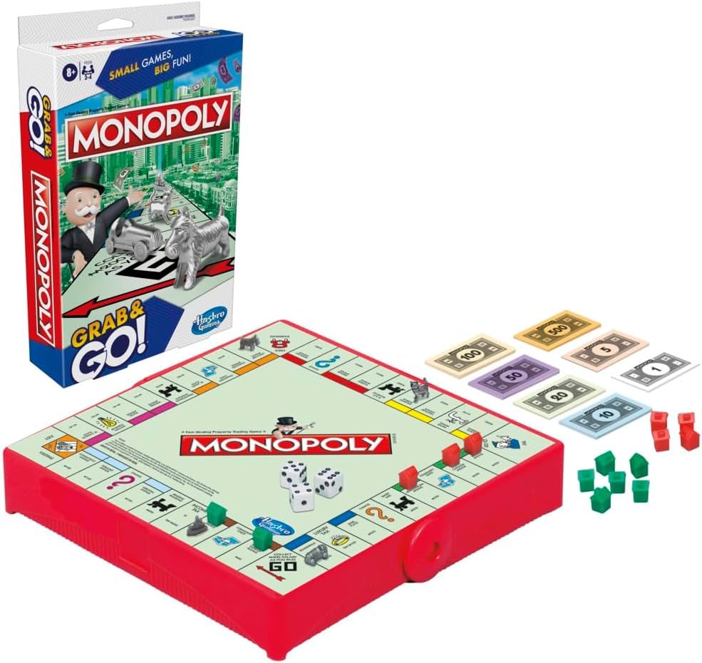 Monopoly board game set with packaging on a white background