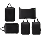 Set of black travel bags with visible brand logo on a white background