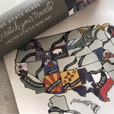 United States map with state flags on a white surface