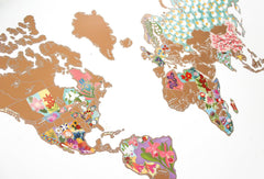 World map with floral designs on a white background