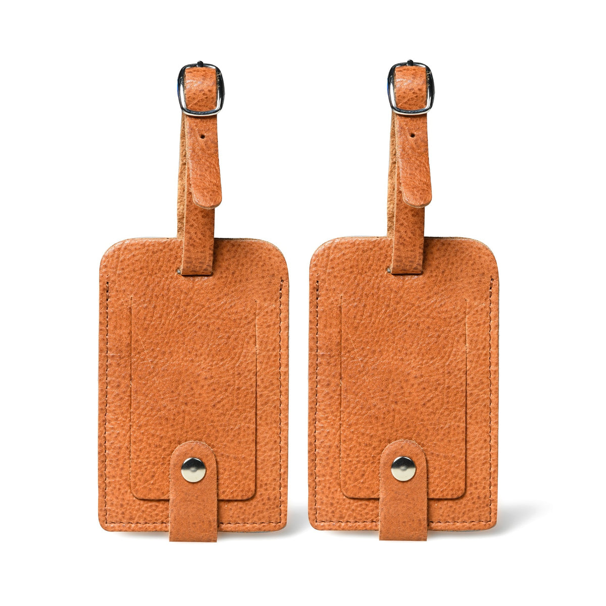 Two brown leather luggage tags on a white background