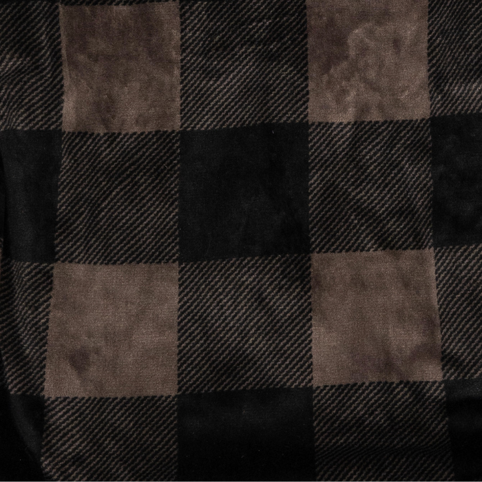 Close-up of a checkered fabric with brown and black squares