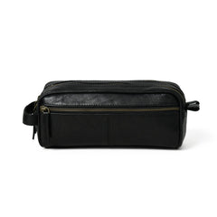 Black leather dopp kit with zipper on a white background