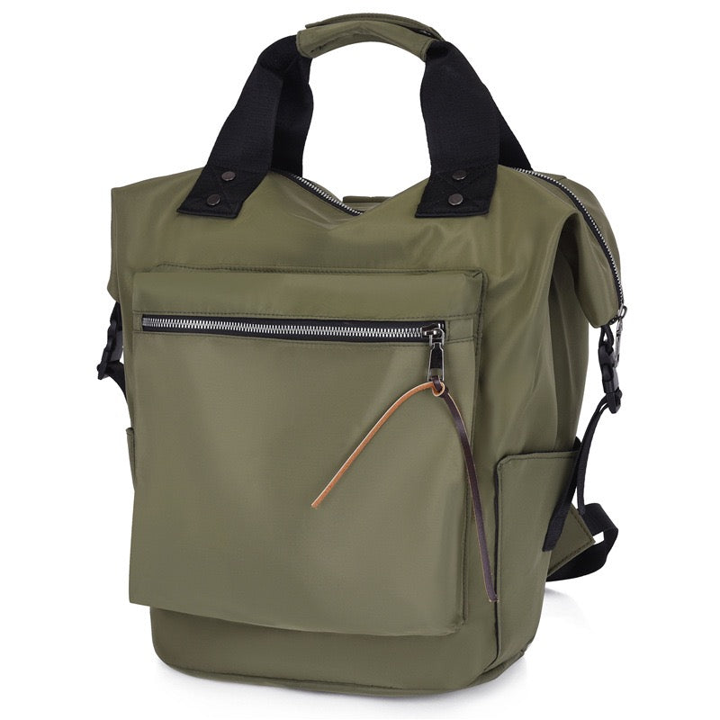 Green backpack with black straps on a white background