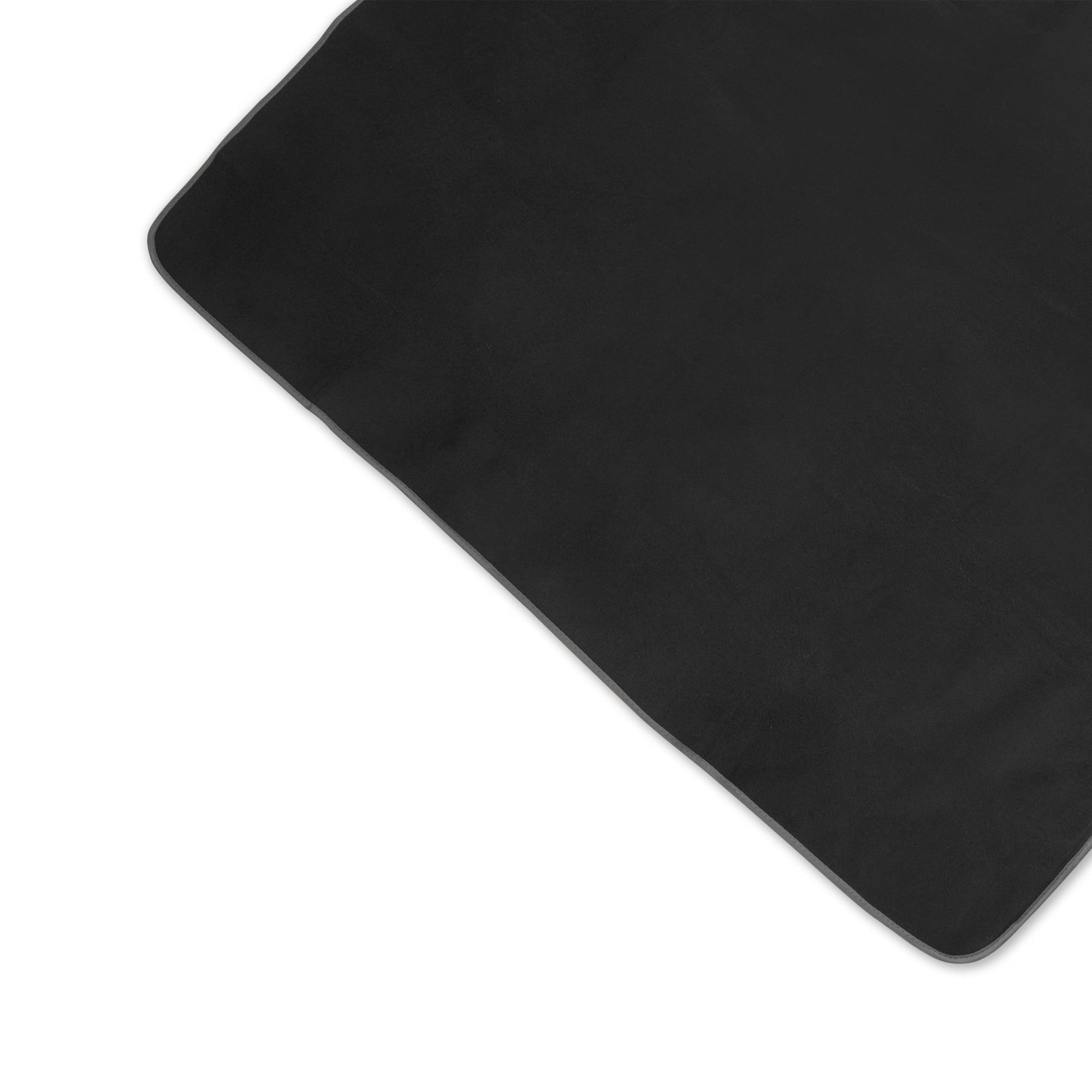 Black rectangular mat on a white background