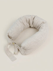 Gray neck pillow on a beige background
