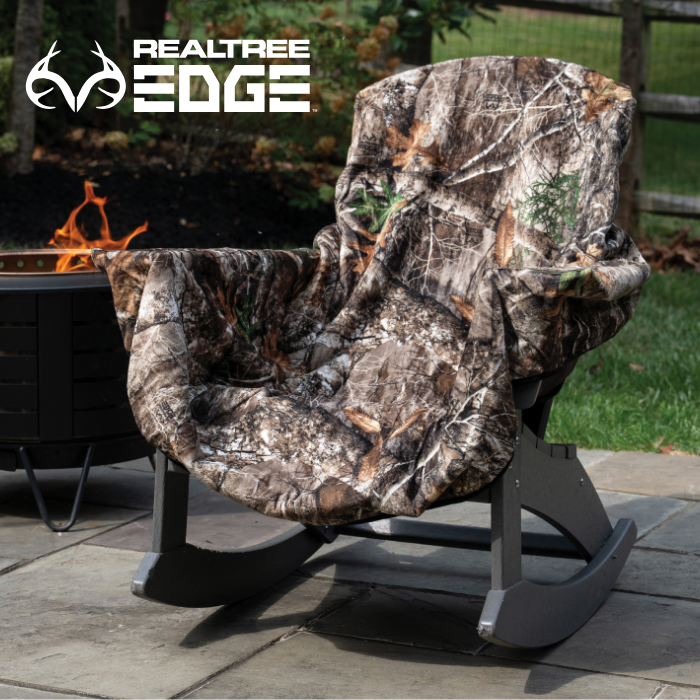 Camouflage chair cover on a rocking chair with Realtree Edge logo in the background.