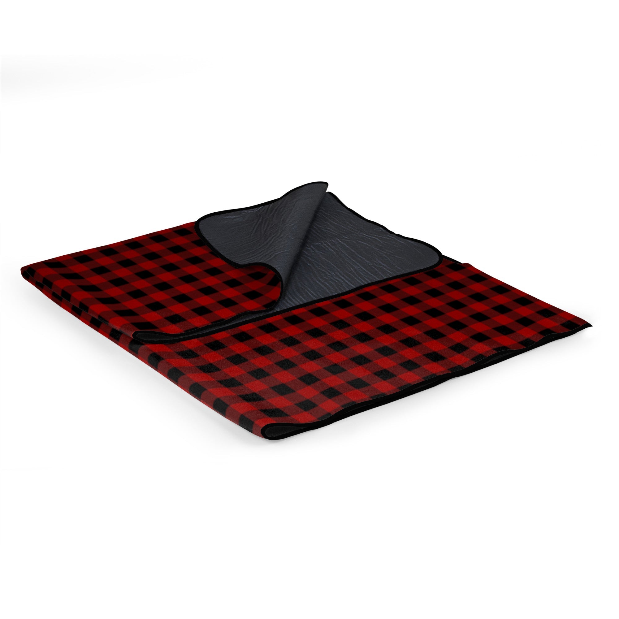 Red and black checkered blanket on a white background