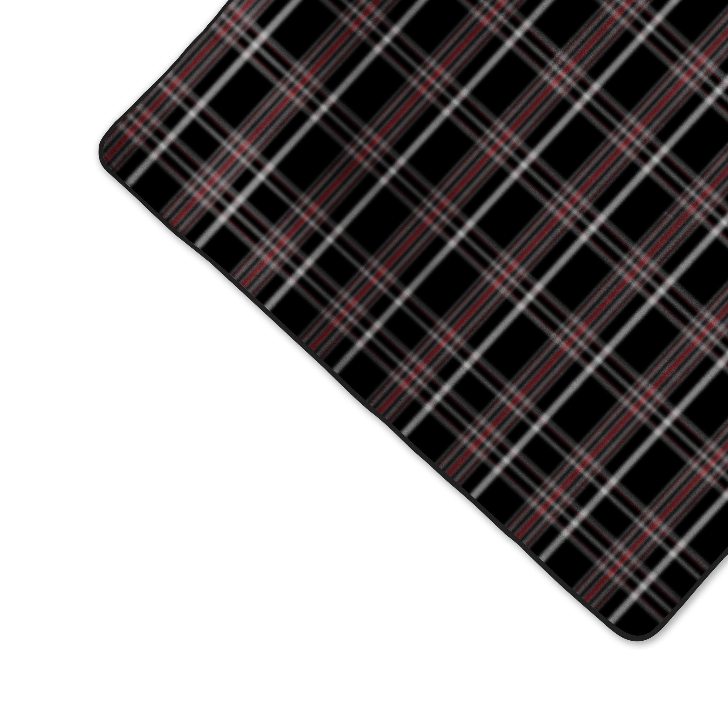 Black tartan patterned mouse pad with red and white lines on a white background