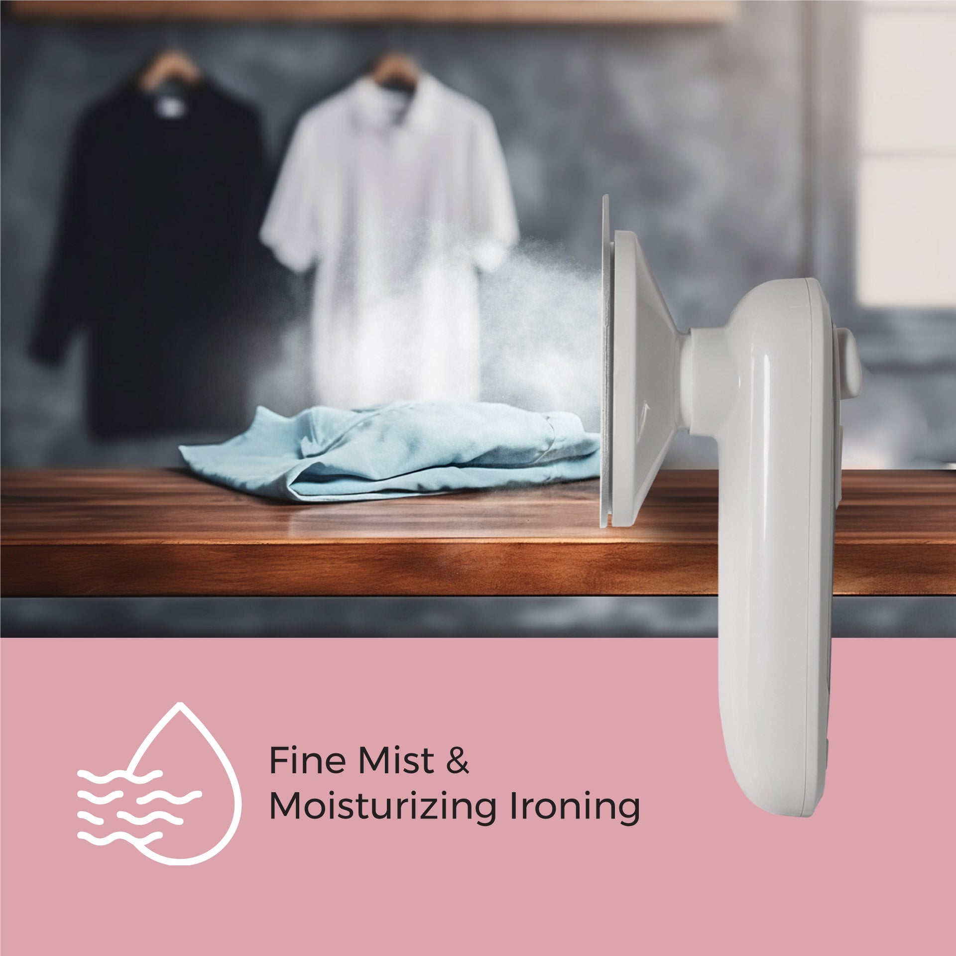 White iron with steam feature on a wooden table with clothes in the background, labeled 'Fine Mist & Moisturizing Ironing'.