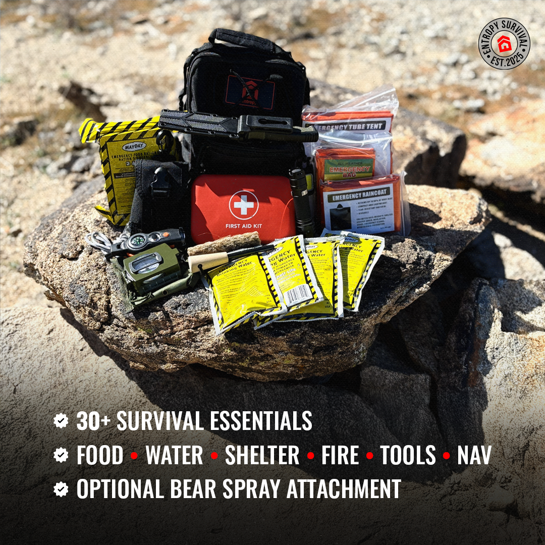 Survival kit with essential items on a rock, featuring a bear spray attachment.