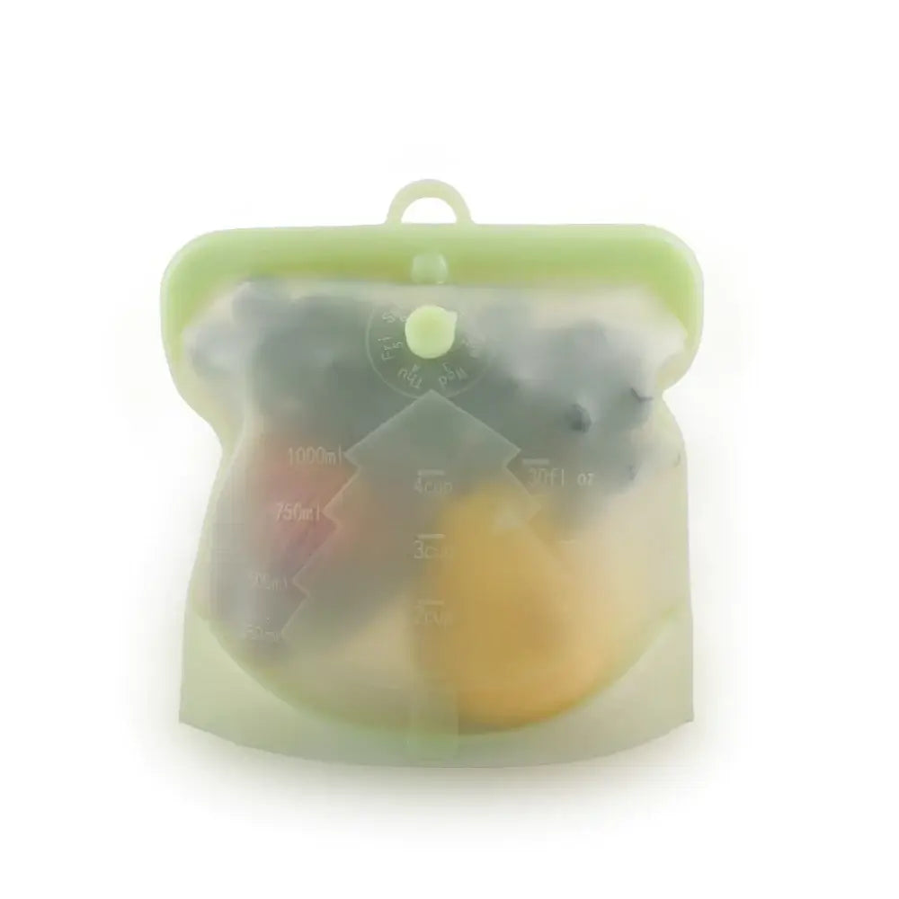 Silicone food storage bag with fruit inside on a white background