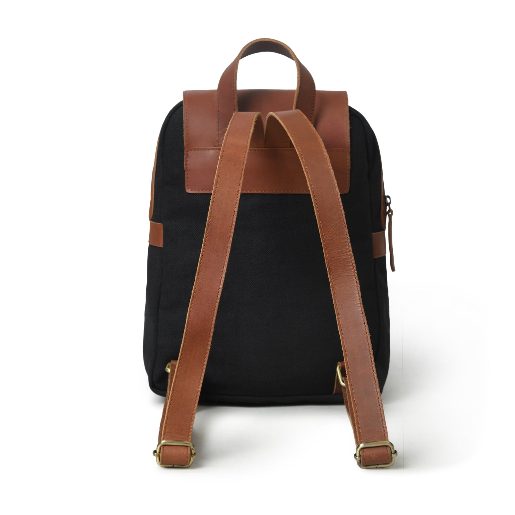 Black backpack with brown leather straps and accents on a white background