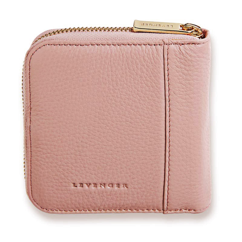 Pink wallet with gold zipper on a white background