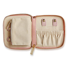 Beige and pink travel wallet with multiple compartments on a white background
