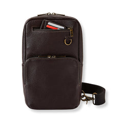 Brown leather crossbody bag with a visible strap on a white background