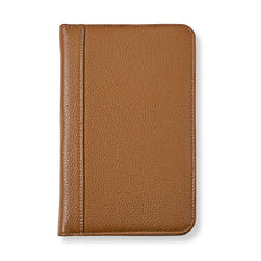 Brown leather notebook on a white background