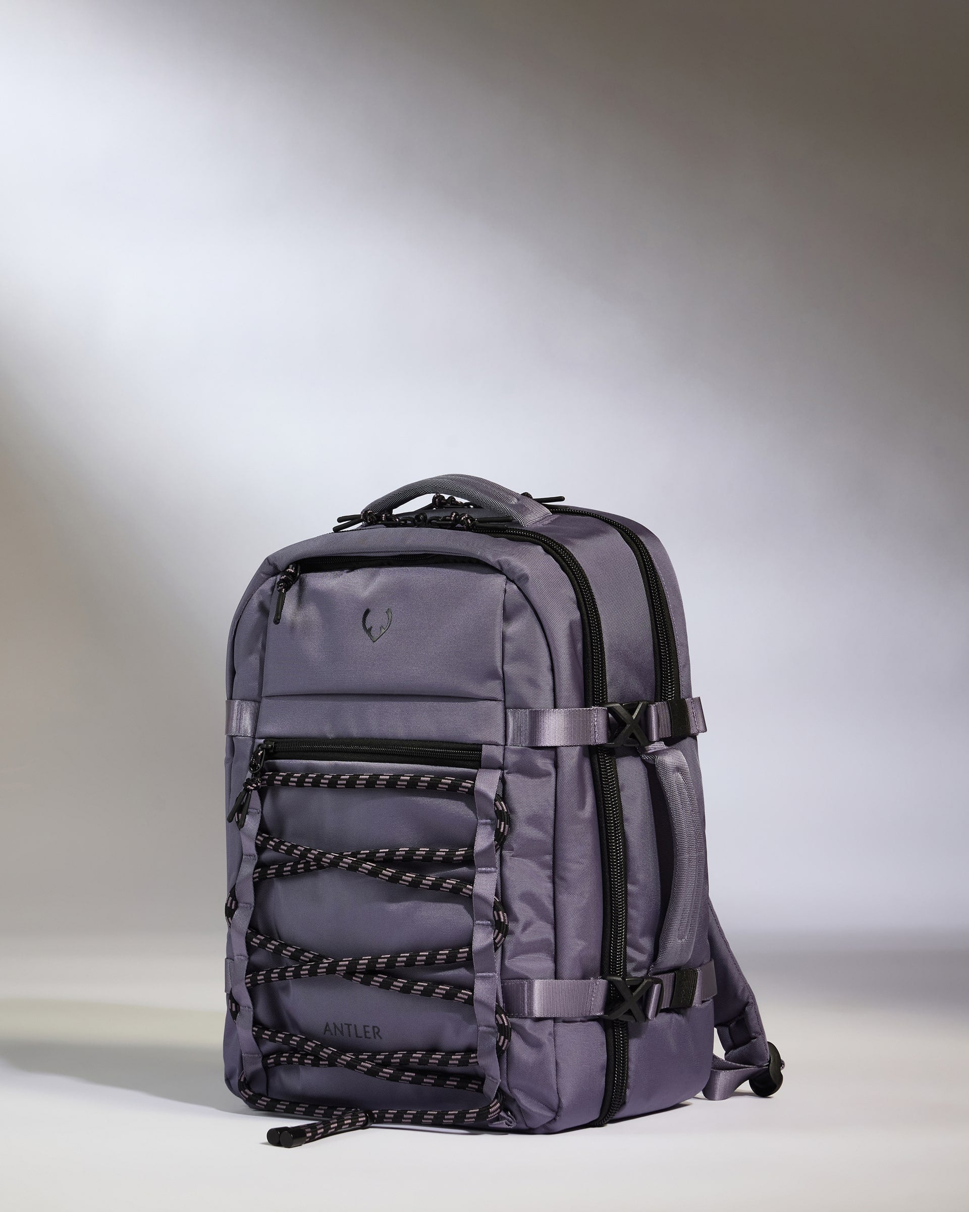 Gray backpack with black accents on a light gray background