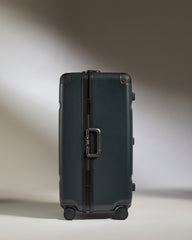 Black suitcase on a gradient background
