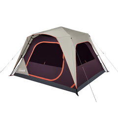 Coleman tent with beige and purple design on a white background