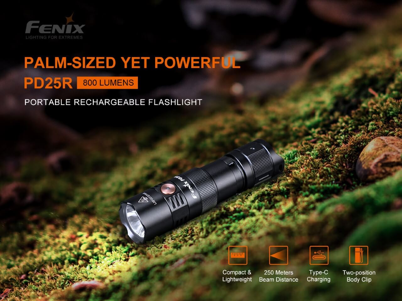 Fenix PD25R flashlight on a mossy surface with product details.