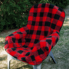 GIF of the chair blanket getting put on a chair 
