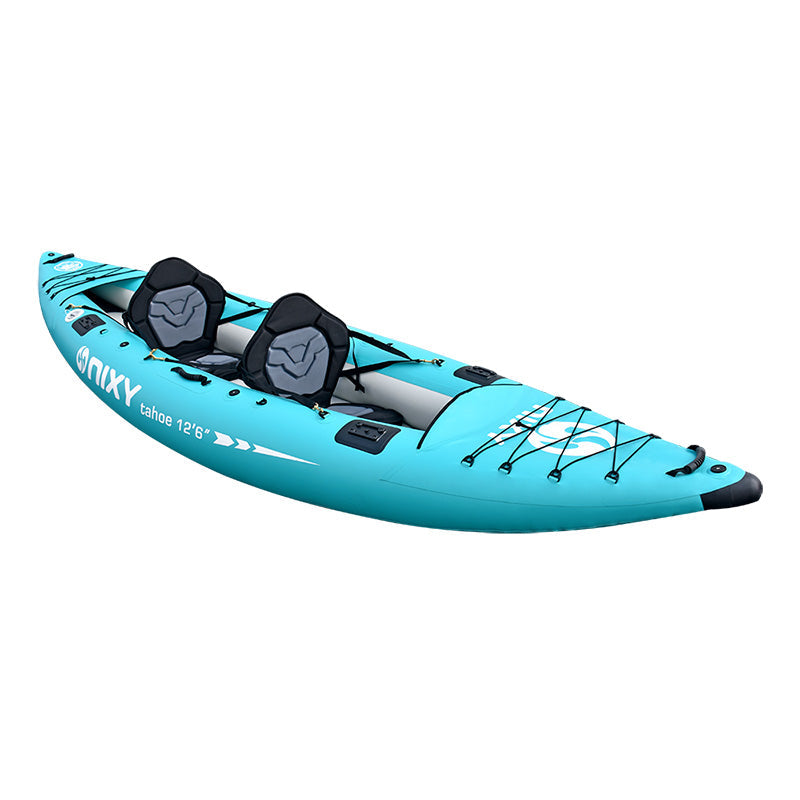 Turquoise kayak with black seats on a white background