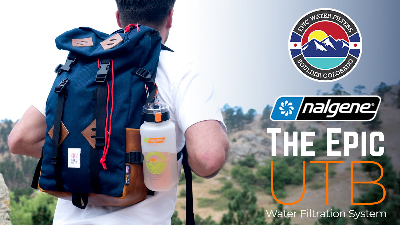 Person with a blue backpack and Nalgene water bottle in a mountainous landscape, featuring Epic Water Filters branding.