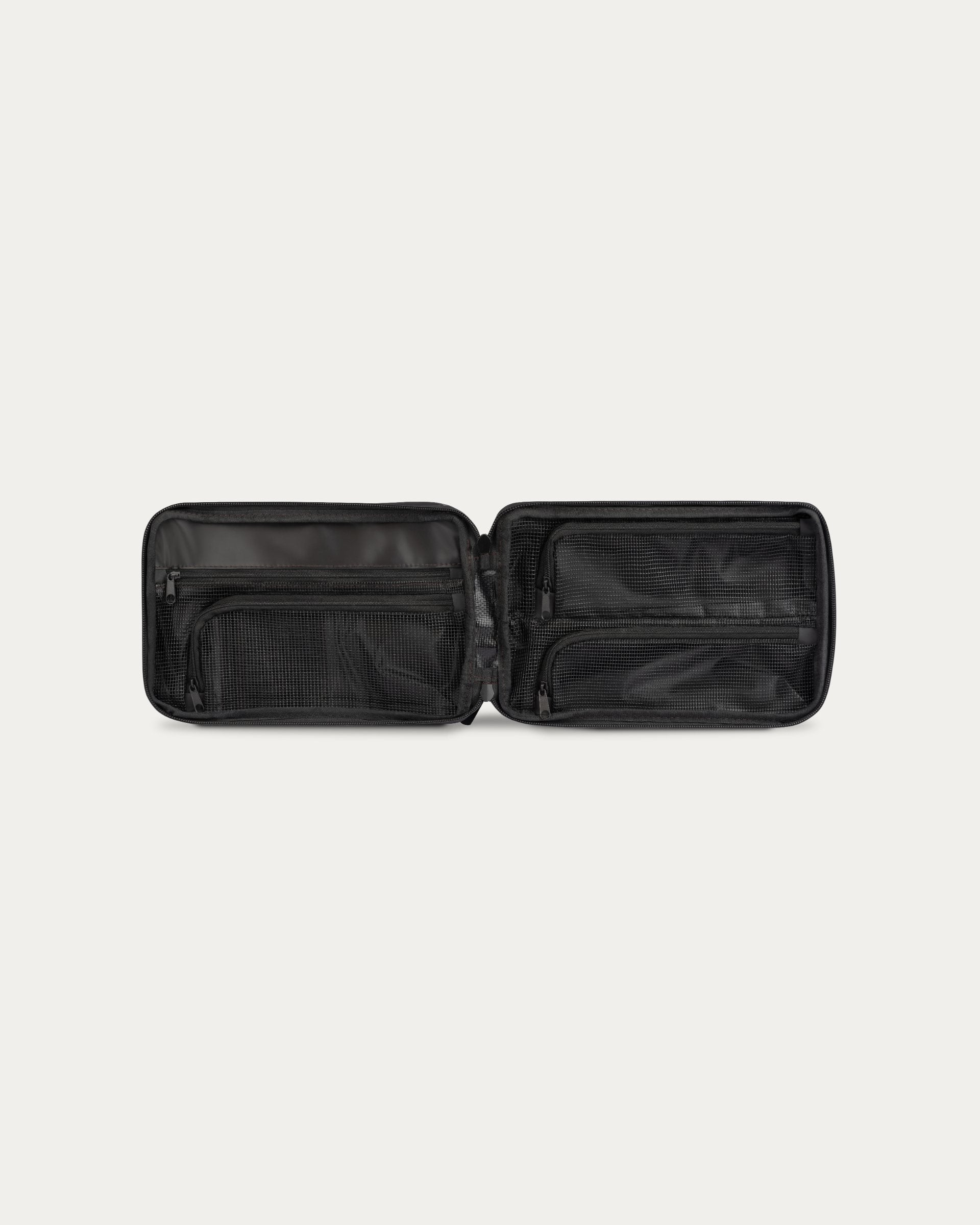 Black leather wallet open on a light gray background