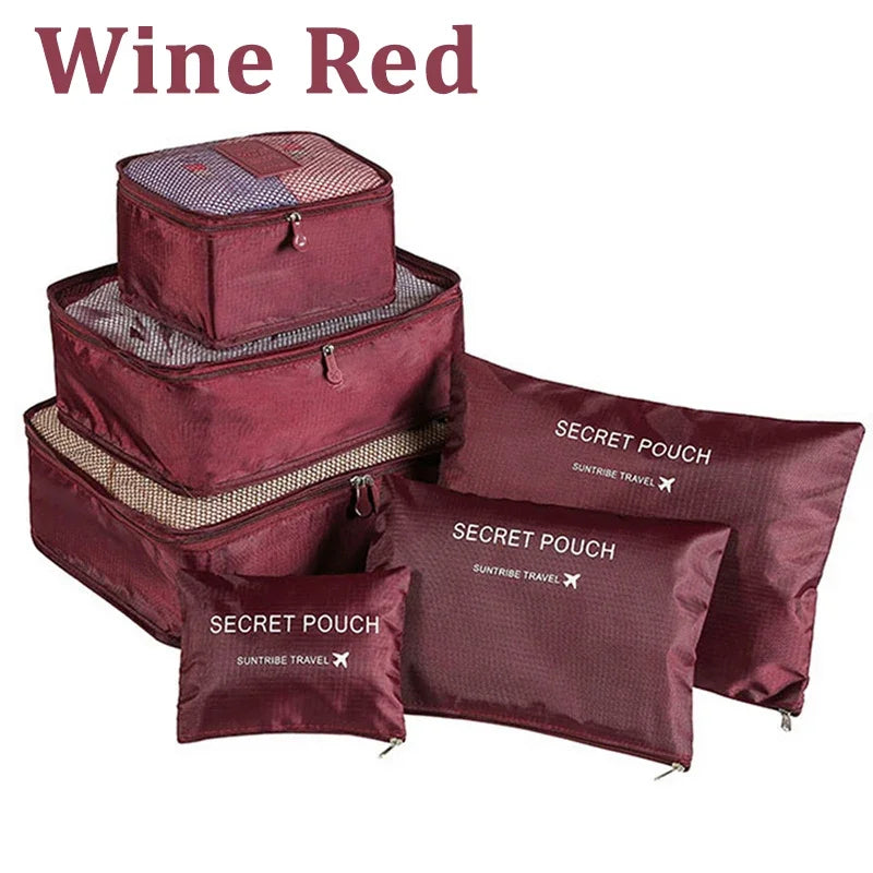 Set of wine red travel packing cubes with 'Secret Pouch' labels on a white background.