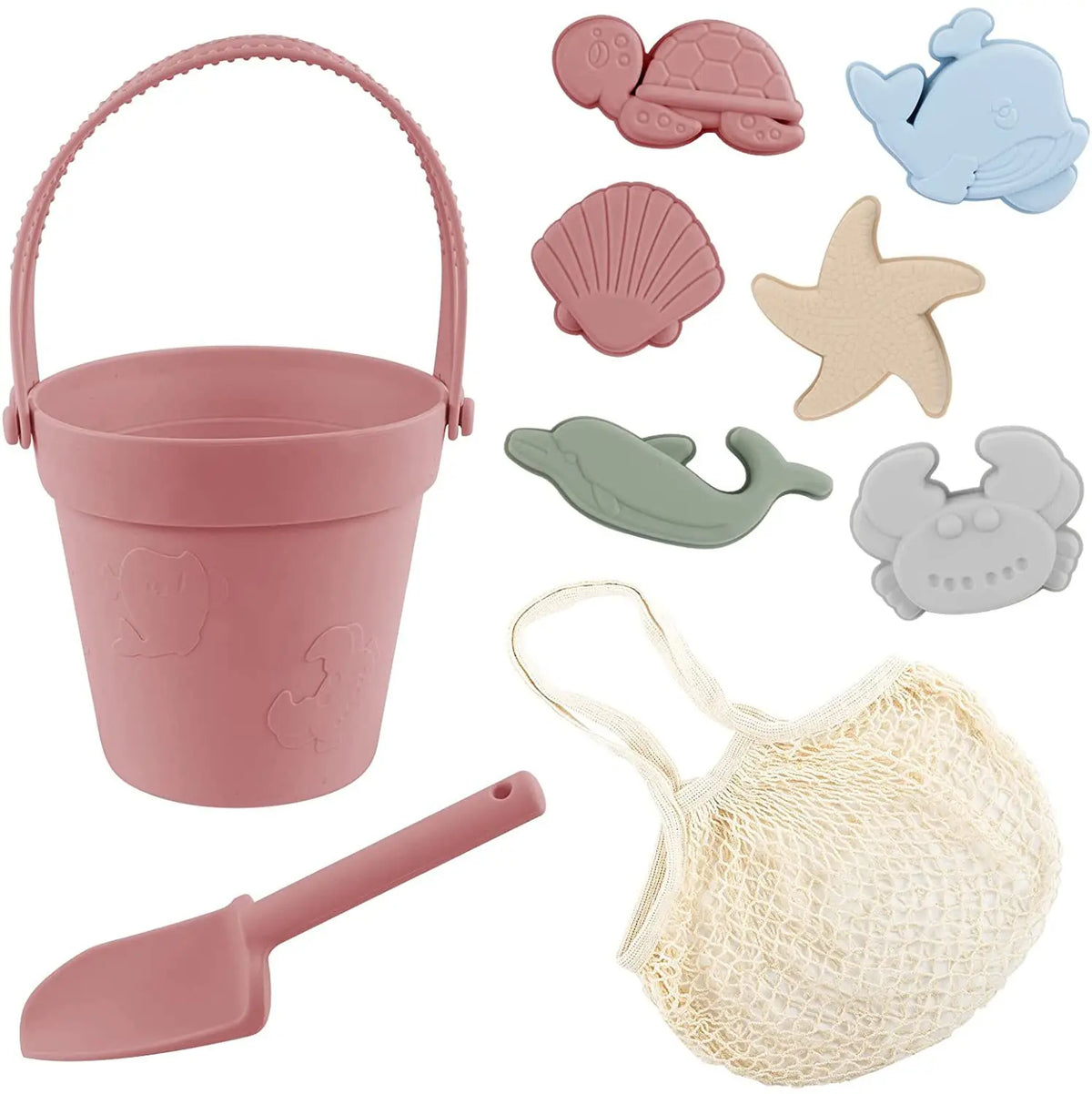 Set of beach toys including a pink bucket, shovel, and net with animal-shaped molds on a white background.