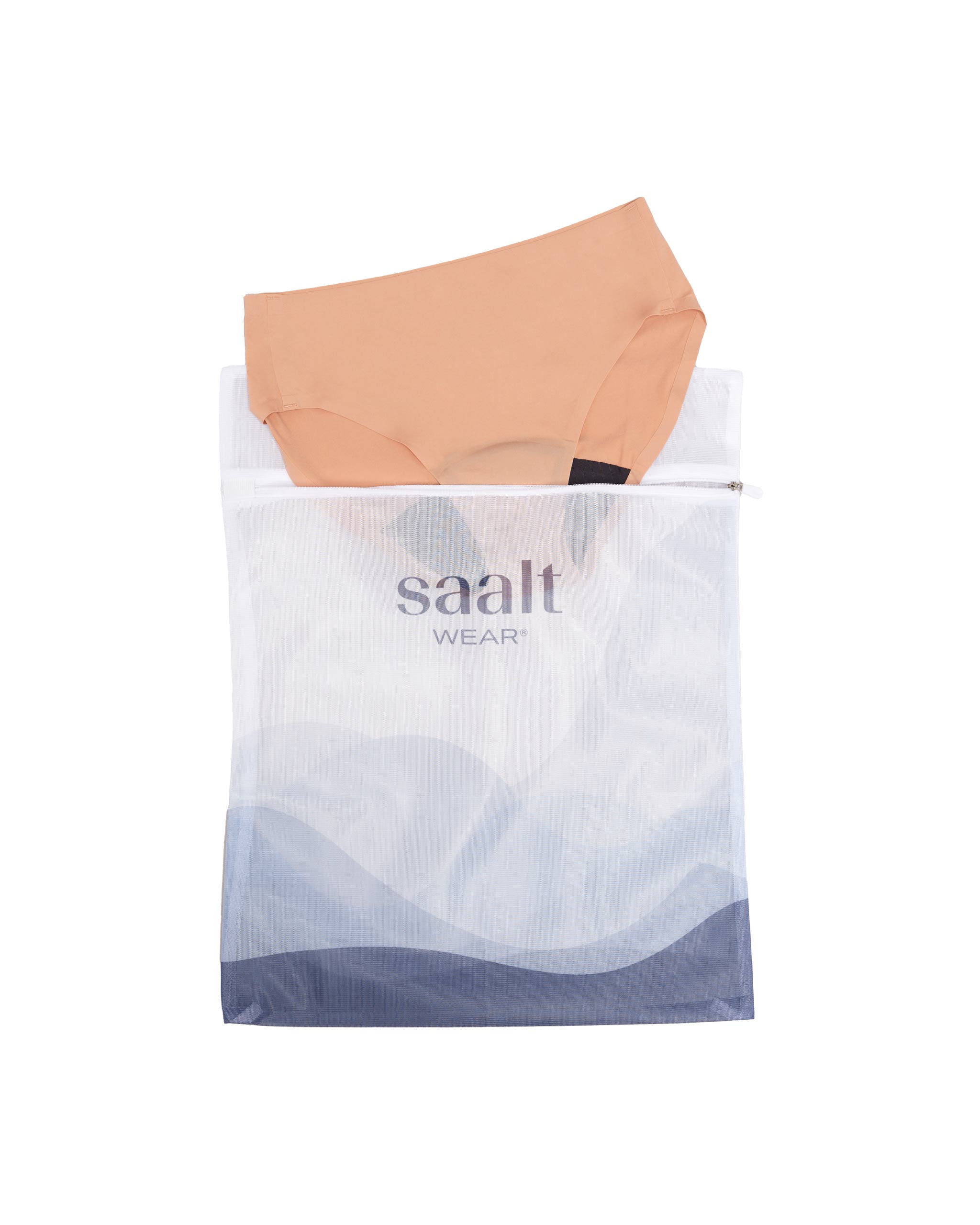 Saalt pouch with a folded beige towel on a white background