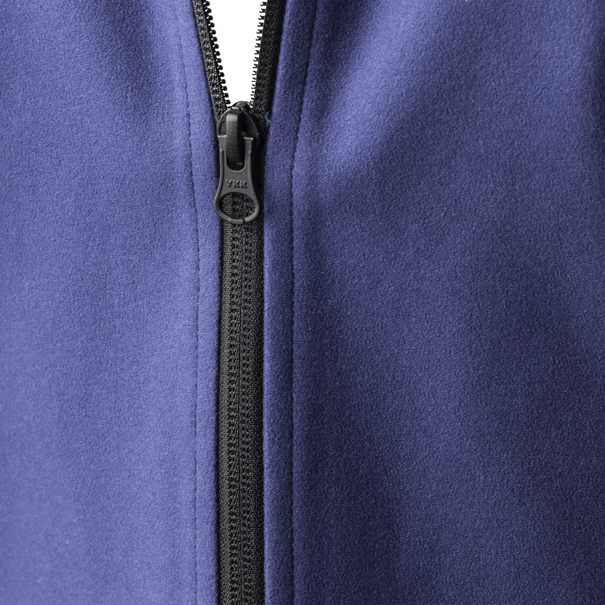 Close-up of a purple fleece jacket with a zipper