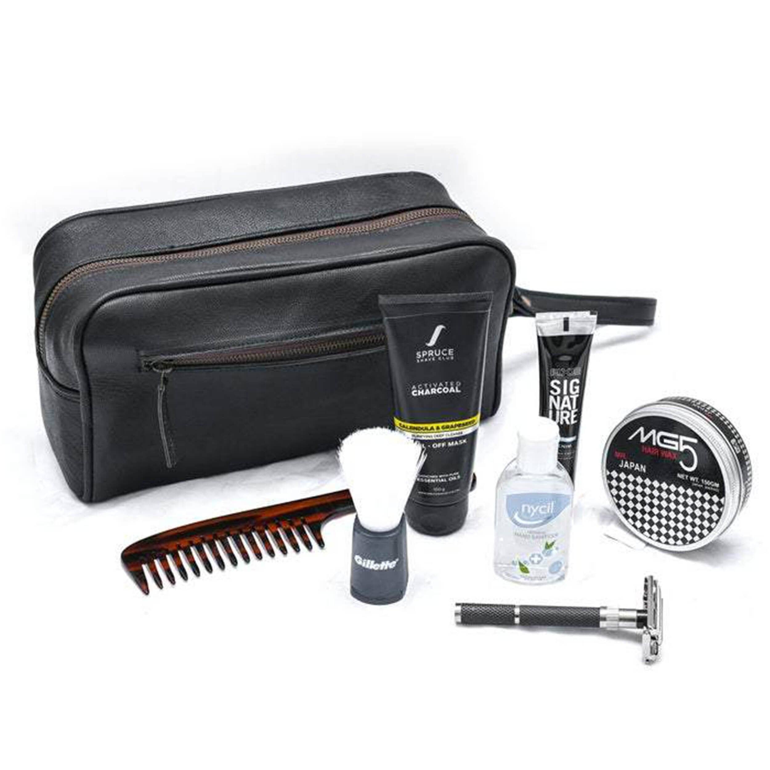 Grooming kit with black toiletry bag, comb, bottles, and other items on a white background