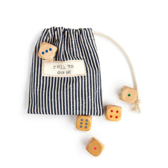 Set of wooden dice with a striped bag labeled 'roll 'em dice set' on a white background