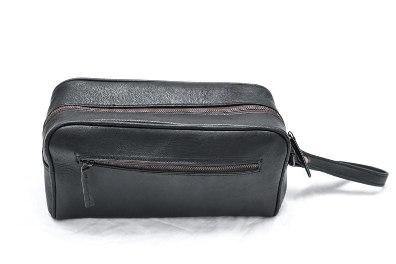 Black toiletry bag with zippers on a white background
