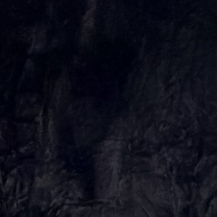 Dark textured fabric pattern