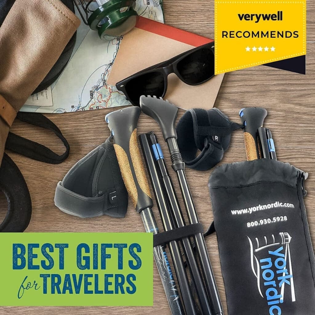Travel gear including hiking poles, sunglasses, and a carrying bag on a wooden surface with 'verywell' and 'York Nordic' branding.